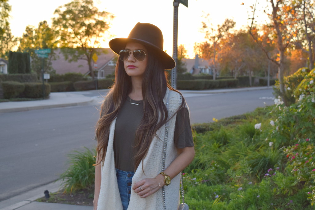 Flare Denim + Sweater Vest | Girl About Town